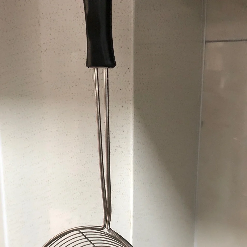 Black-Handled Stainless Steel Skimmer Spoon for Frying and Draining
